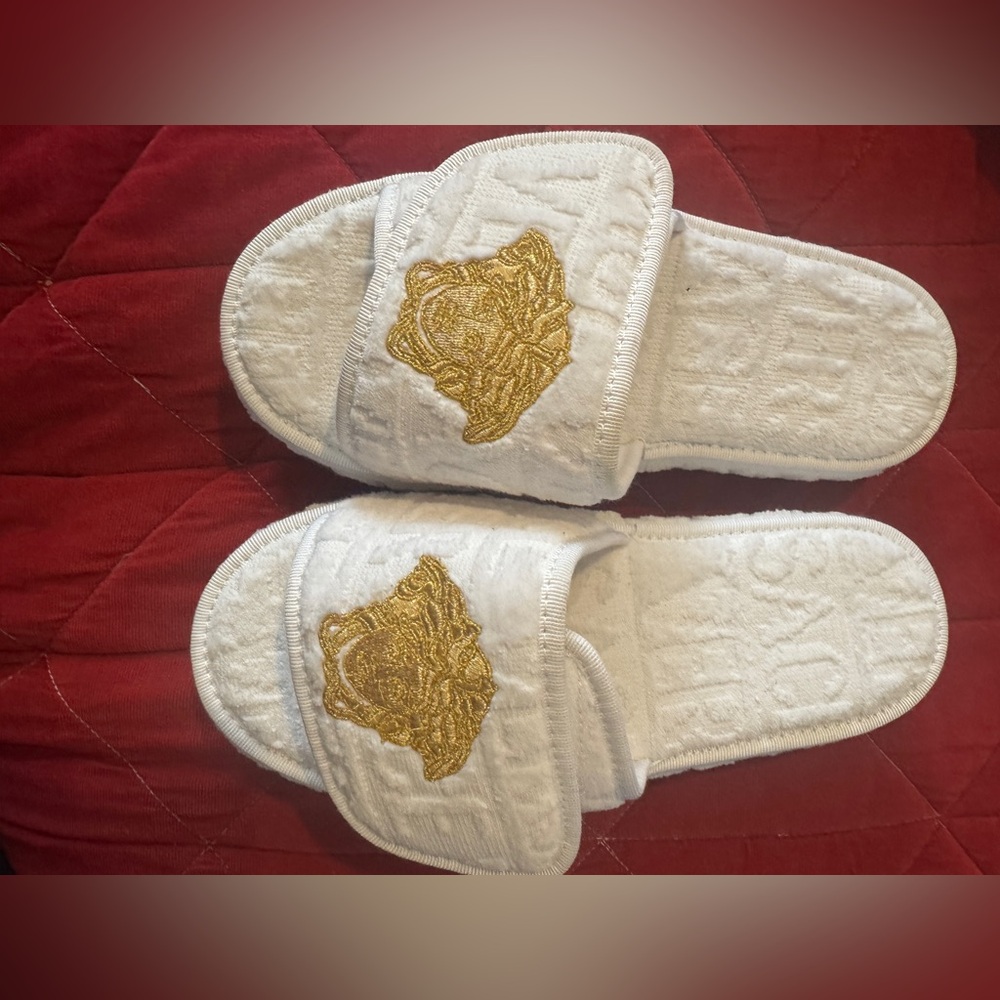 New , never use Versace size 7.5